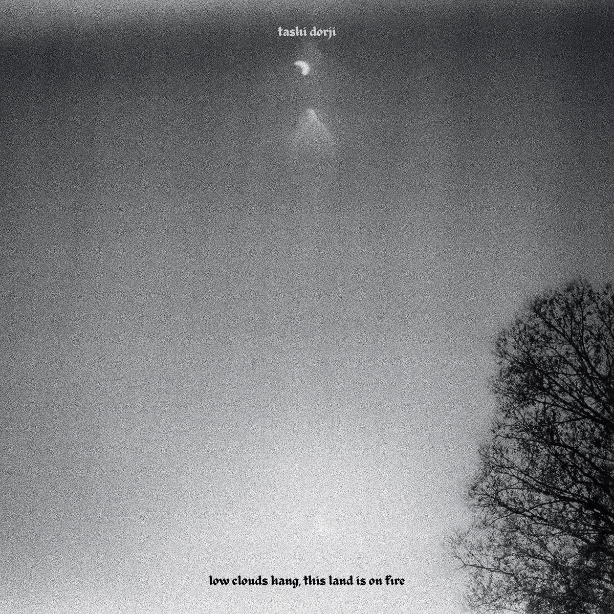 Tashi Dorji - low clouds hang, this land is on fire